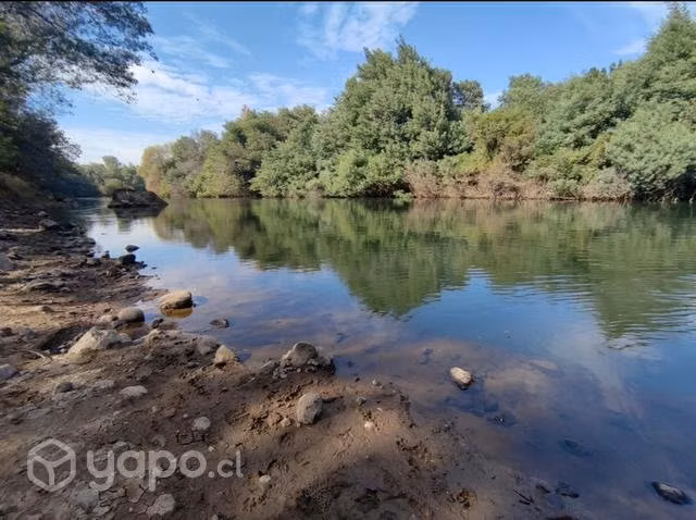 Sitio 5.000 m2 con río