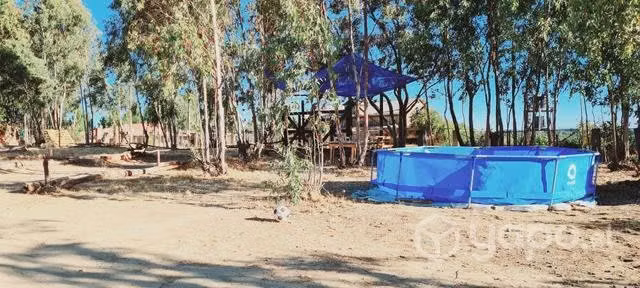 Parcela con casa