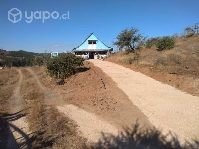 Vendo parcela con casa