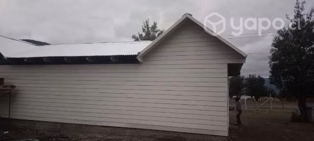 Vendo parcela con casa.
