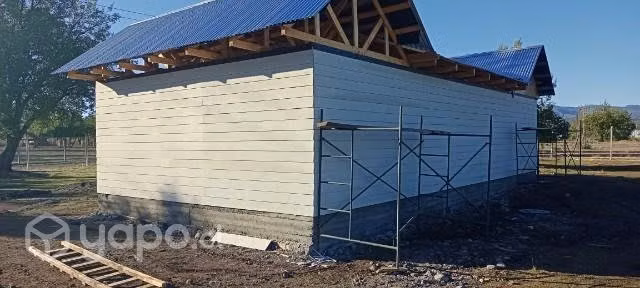Vendo parcela con casa.
