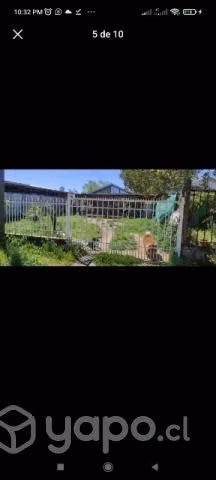 Terreno con 3 casas.