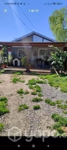 Terreno con 3 casas.