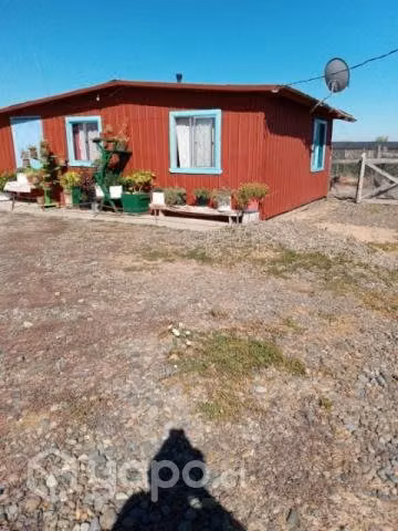 Terreno con casa
