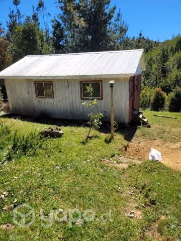 Venta de terreno con casa y bodega