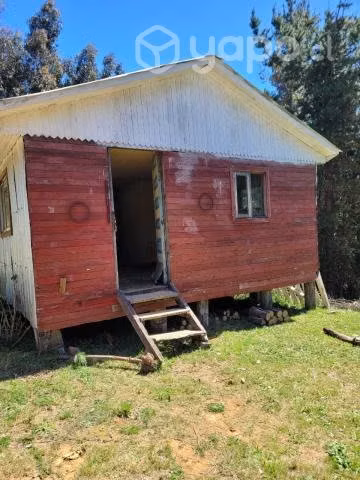 Venta de terreno con casa y bodega
