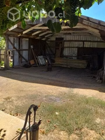 Terreno de 3916 m2 con dos casas
