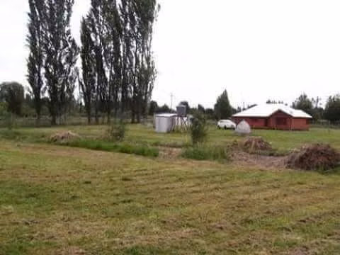 Parcela con casa en ruta sur
