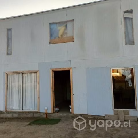 Terreno con casa de 2 pisos