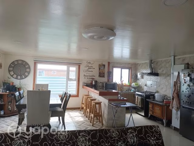Vendo terreno con 2 casas