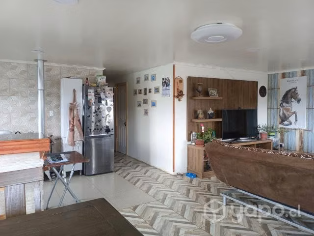 Vendo terreno con 2 casas