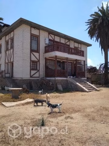 Terreno con casa y bodegas