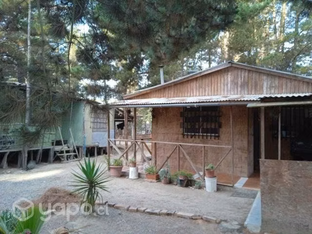 Terreno con dos casas
