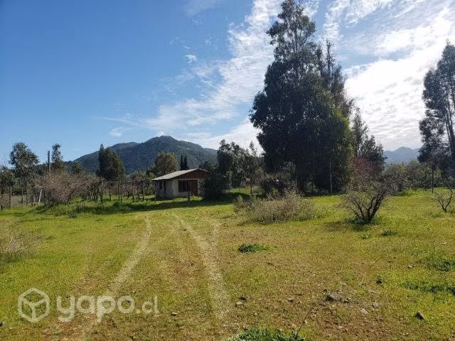 Terreno con casa