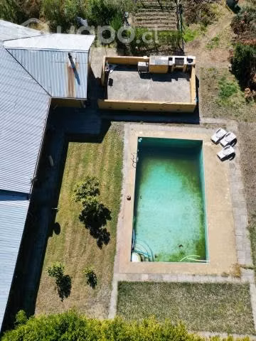 Se vende parcela con casa y piscina en San Rosendo