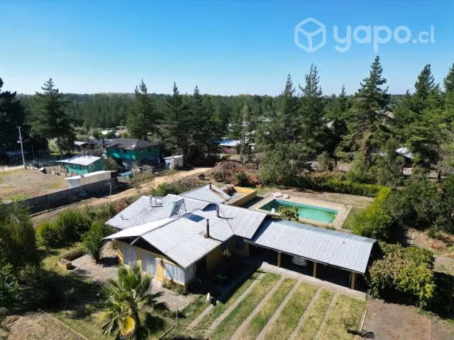 Se vende parcela con casa y piscina en San Rosendo