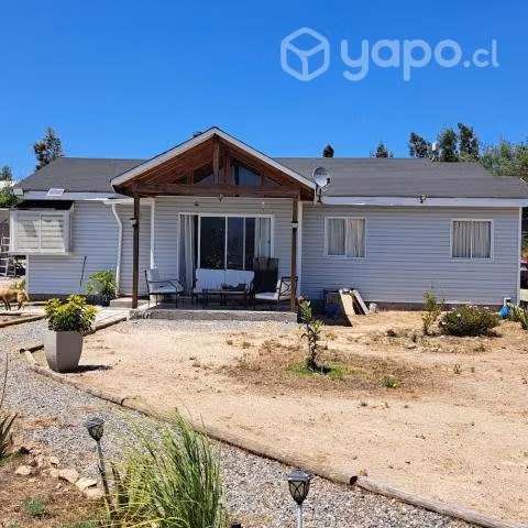 Se vende hermosa parcela con casa y piscina