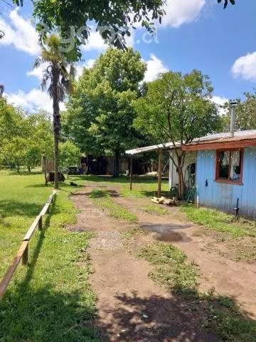 Terreno con casa habitación