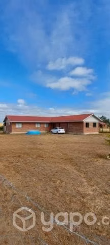 Vendo parcela con 3 casas