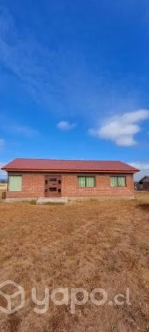 Vendo parcela con 3 casas