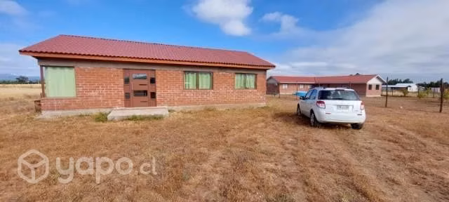 Vendo parcela con 3 casas