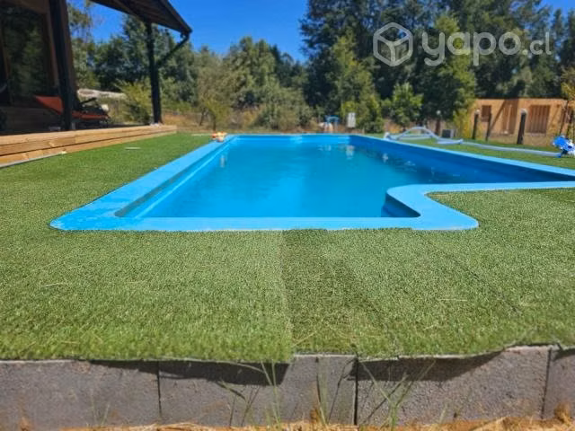 Parcela con casa, cabañas, quincho y piscina