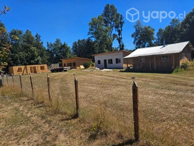 Parcela con casa, cabañas, quincho y piscina