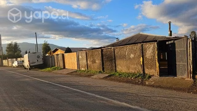 Terreno con dos casas y una piscina