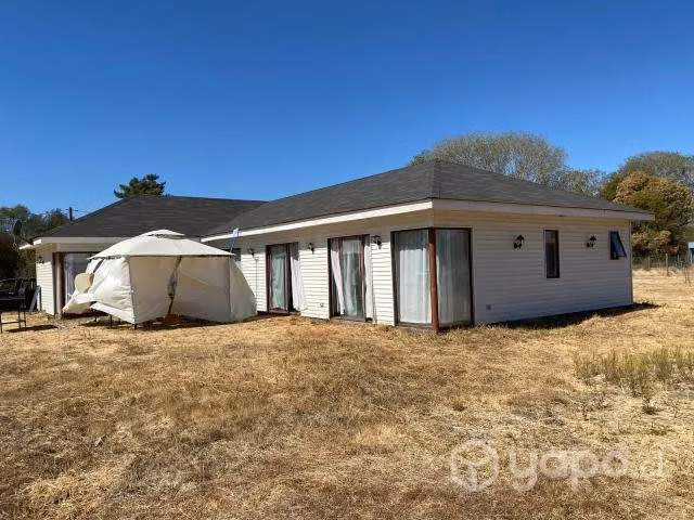 Parcela con casa y piscina en condimio vende dueño