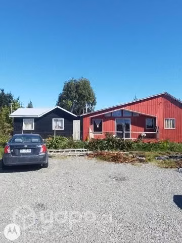 Vendo terreno con 3 cabañas