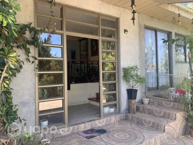 Parcela con casa