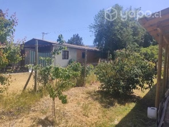 Venta de parcela con dos casas.