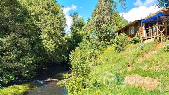 Hermosa Cabaña a orilla de rio
