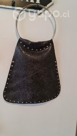 Cartera cuero tallado