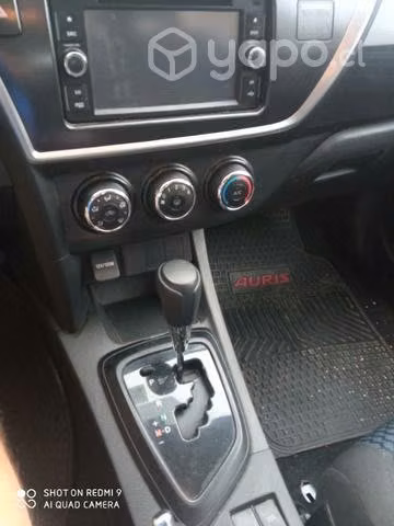 Venta de auto Toyota auris año 2015 por cambio