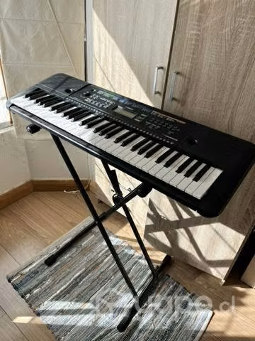 Teclado Yamaha Psr-e253 + Atril y adaptador