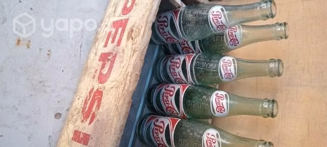 Antiguas jaba y botellas PEPSI- COLA