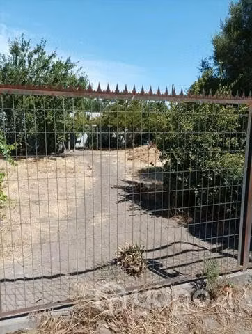 Venta de sitio con casa