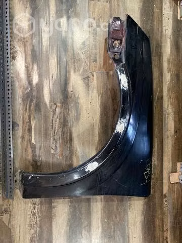 Tapabarro Chevrolet corsa lado conductor