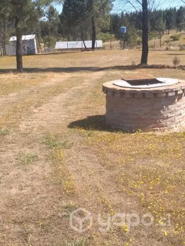 Parcela con casa y agua