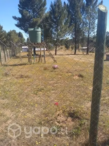 Parcela con casa y agua