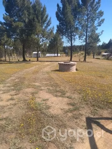Parcela con casa y agua