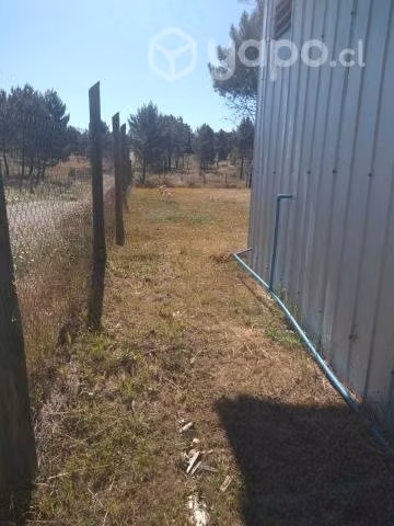 Parcela con casa y agua