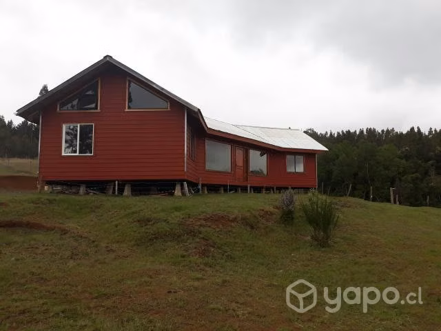 Terreno con casa