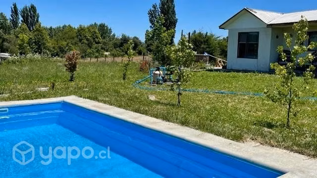 Parcela con casa
