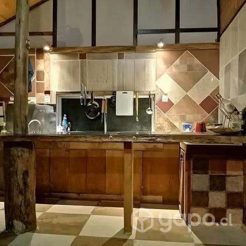 Terreno con casa, cabañas y piscinas