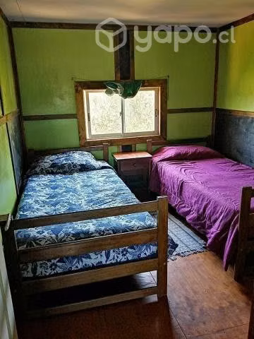 Terreno con casa, cabañas y piscinas