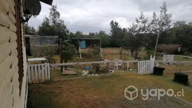 Terreno con casa