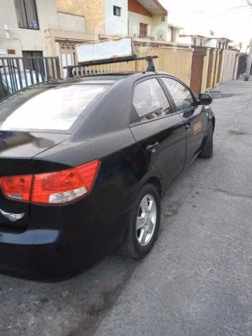 Taxi Colectivo KIA MOTORS CERATO 2010