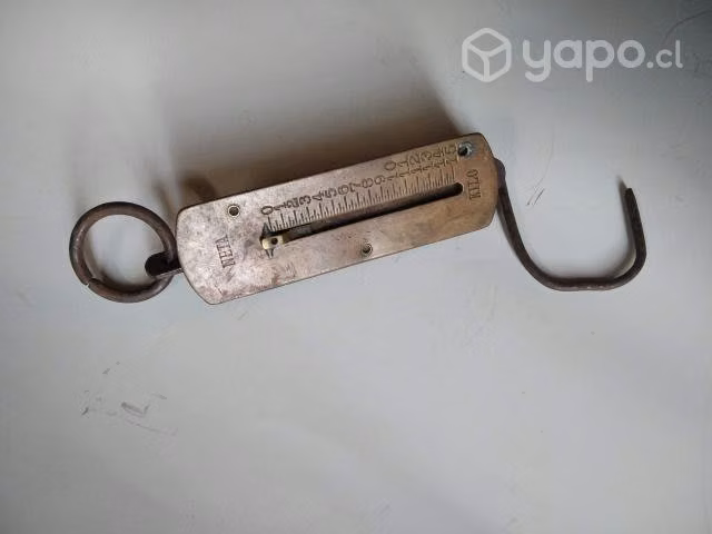 Pesa antigua de bronce